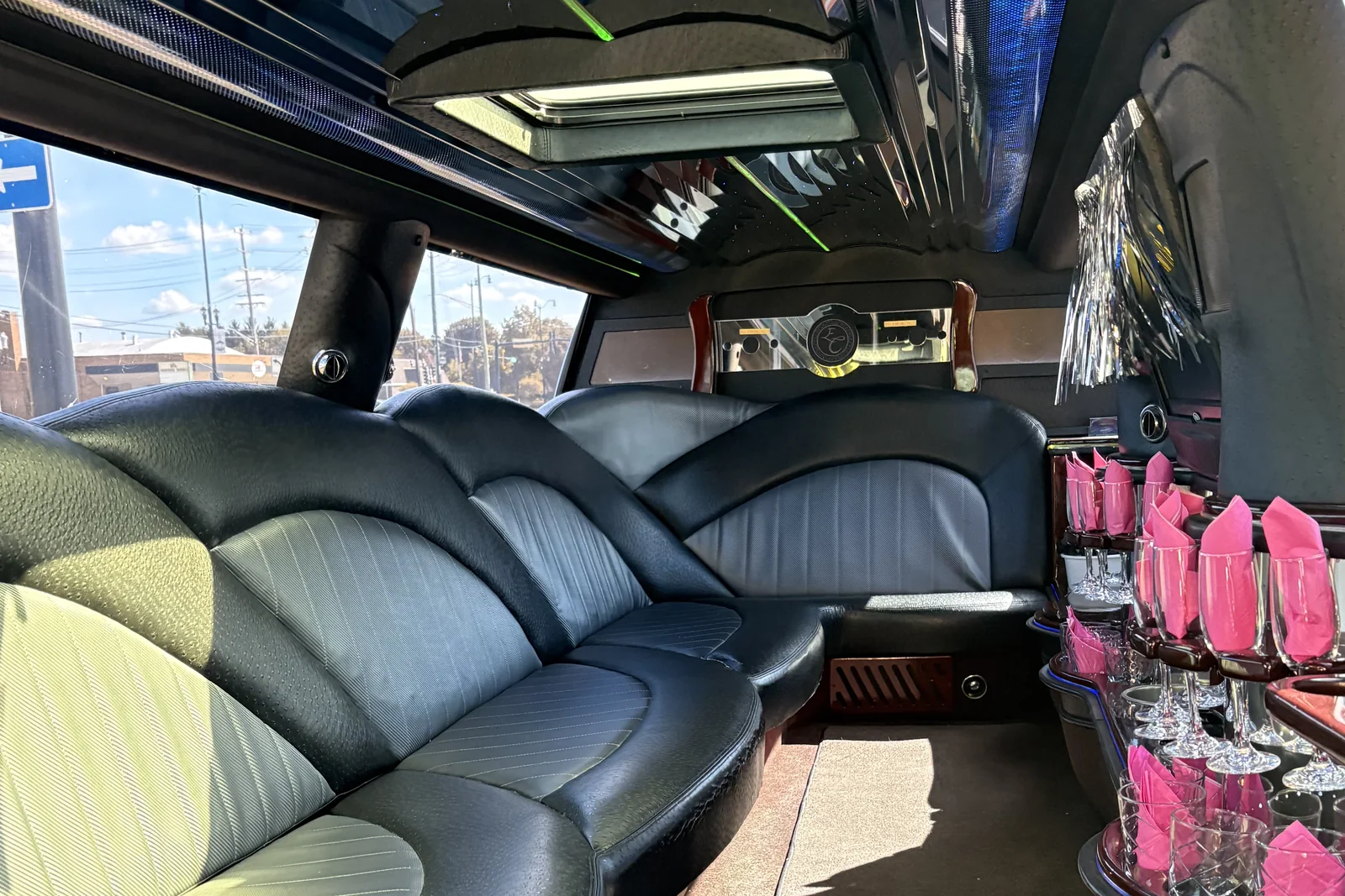 The bar inside the Cloud 9 stretch limousine, set with glassware and napkins